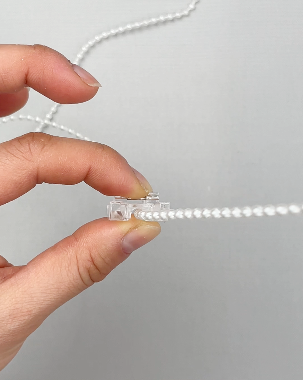 毛糸をぬいつける